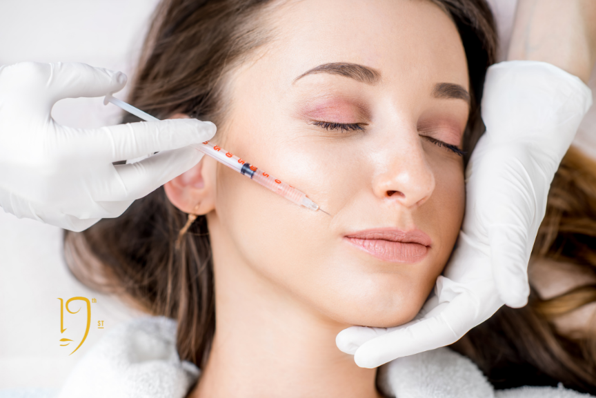 Woman receiving injection at cosmetic dermatology near Georgetown